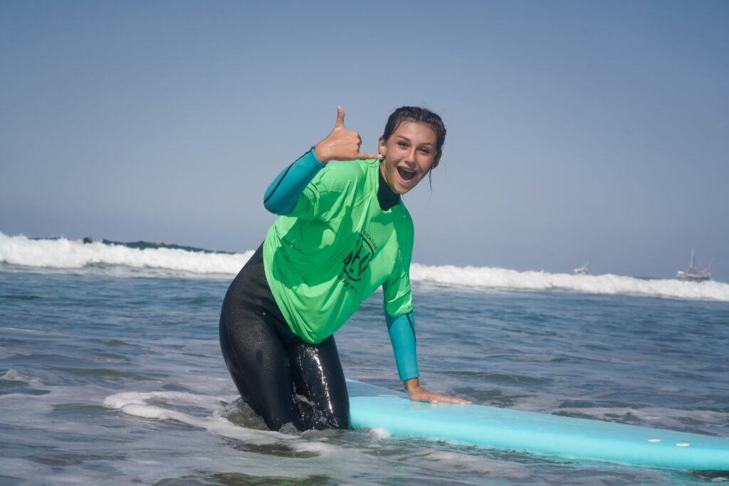Surfer girl camper at Surf Education Academy SEA future legends tween and teen camp