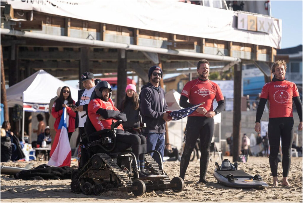 Sean Brody and Olympic Para Surfing Team watching the waves during competition