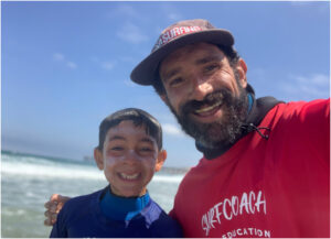 Sean Brody and son, sharing memories at La Jolla Shores during the summer camps