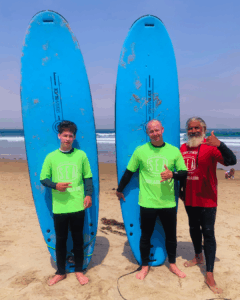 SEA surf lessons at La Jolla shores in San Diego Califronia with a dad and a son