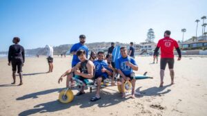Adaptive surfers at CAF and SEA event in La Jolla Shores San Diego